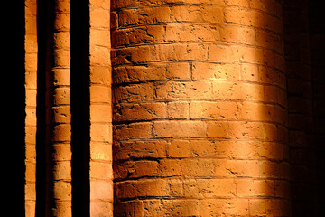 red-brick wall round and square, craftsmanship mastery, warm red, ancient building trade