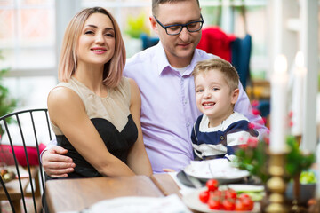 Happy family during holiday dinner at home