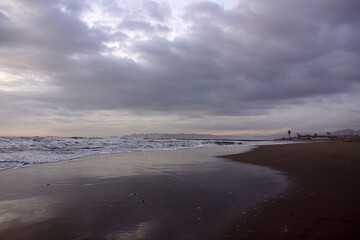 beach in the winter with clouds