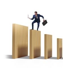 Businessman in domino effect concept