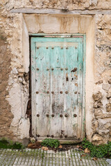 Old wooden door with peeling paint