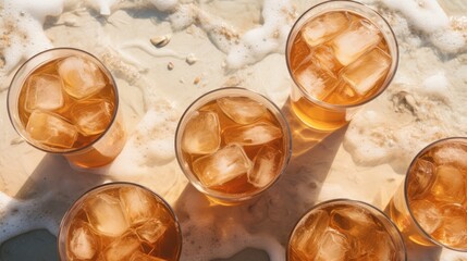 iced drinks, against the background of the beach against the backdrop of sea foam, summer, vacation. heat