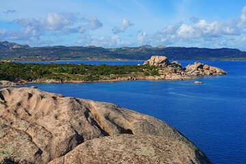 Obraz premium View of the sea and shoreline near Baja Sardinia on the (Emerald Coast), an exclusive coastal destination in Northern Sardinia on the Tyrrhenian Sea