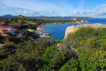 Fototapeta na wymiar View of the sea and shoreline near Baja Sardinia on the Costa Smeralda (Emerald Coast), an exclusive coastal destination in Northern Sardinia on the Tyrrhenian Sea