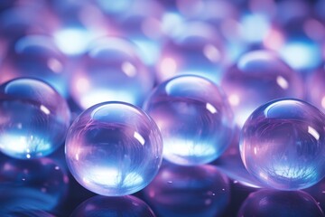  a bunch of soap bubbles sitting on top of each other in front of a black background with blue and pink lights.