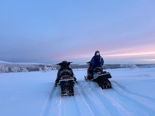 person riding a sledge