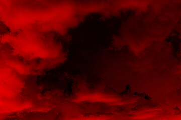 Black dark red sky with clouds. Dramatic background for design. Bloody fiery sunset night. Ominous...