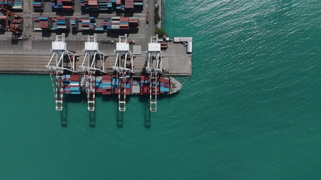 Aerial view from a container drone. Container ships in export-import and logistics business Transporting goods to large ports Worldwide shipping and logistics business International business abroad