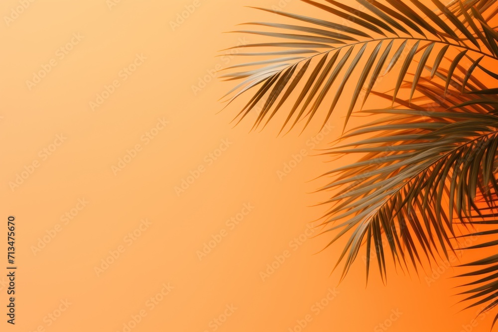 Poster a close up of a palm tree with a yellow sky in the background and a red light in the foreground.