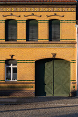 Ornate Yellow Brickwork on Historic Building in Treuenbrietzen, Germany