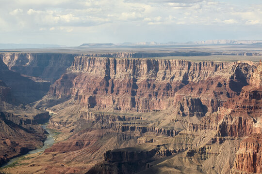 the Grand Canyon in Arizona, showcasing the iconic rock formations, vast canyon landscape, and the majestic views along the South Rim and North Rim.