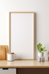Wooden Frame on Desk With Potted Plant