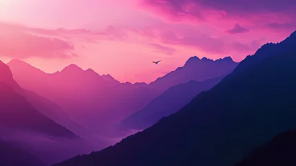 Zelfklevend Fotobehang The silhouettes of the mountains create a magical contrast with a gamut of pink and purple sunset, © JVLMediaUHD