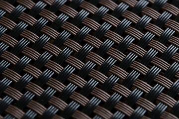 Abstract plastic braided background in close-up.