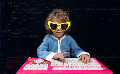 small infant girl with computer