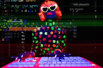 glow woman on computer