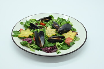 Seafood salad, mussels photo above on white background, photo for menu in restaurant 