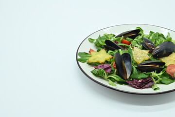 Seafood salad, mussels photo above on white background, photo for menu in restaurant 