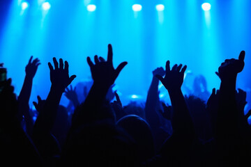Club, concert and audience with hands or lights for music, party and rave festival with spotlight...