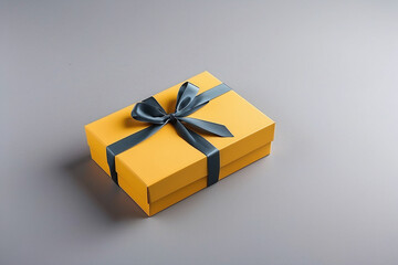 yellow gift box on the grey paper background	
