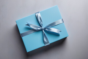 blue gift box on the grey paper background