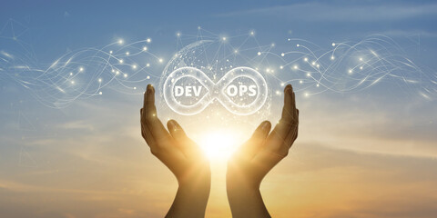 DevOps: Man Holding Global Network and Connecting Data of Development and Operations with Business on the Internet, Streamlining Processes, Continuous Integration. - obrazy, fototapety, plakaty