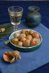 macro snails with pesto sauce photo above, snails with basil pesto, Grana Padano and pine nuts