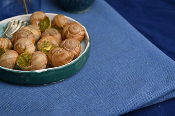 macro snails with pesto sauce photo above, snails with basil pesto, Grana Padano and pine nuts