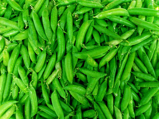 Delicious Green Peas: Fresh Organic Legumes for Vibrant Recipes and Healthy Meals, green peas top view as background