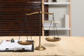 Notary contract. Scales of justice and documents on wooden table