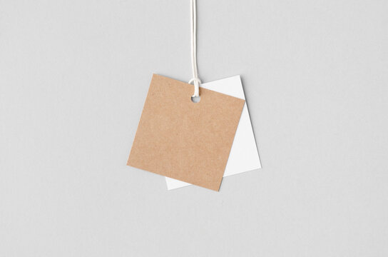 Kraft and white square clothing tag, gift tag mockup.