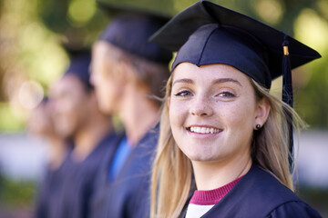 Happy woman, portrait and student in outdoor graduation for education, learning or qualification. Female person or graduate smile in group for higher certificate, diploma or degree at campus ceremony