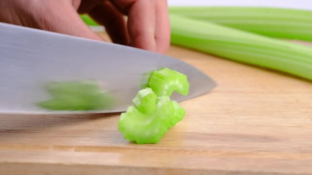 celery is sliced on a piece of bread in close-up
