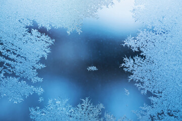 Background with frosty patterns on glass, template for designer
