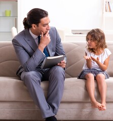 Child psychologist attending small girl