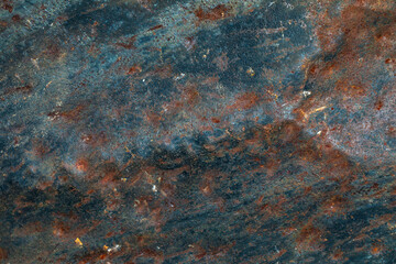 Flat background of old metal sheet with worn paint and traces of corrosion