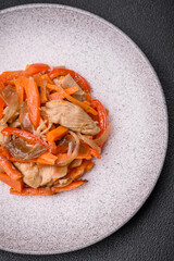 Delicious fresh stew with chicken or turkey with slices of sweet pepper and carrots