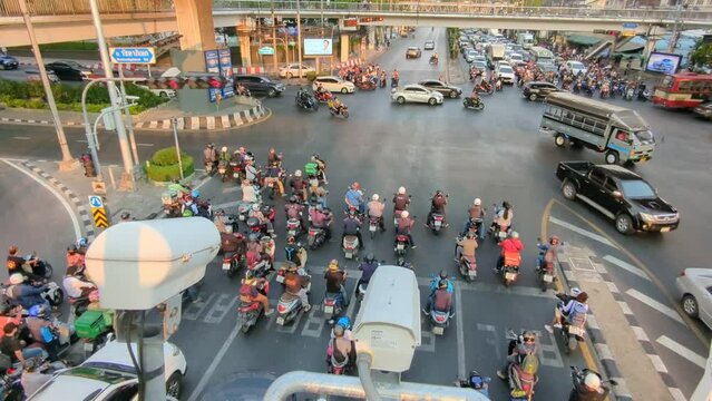Time lapse of busy traffic during rush hour on the roads of Bangkok,Thailand. A bustling scene of vehicles navigating the crowded streets in one of the world's most vibrant cities.Timelapse video,BTR
