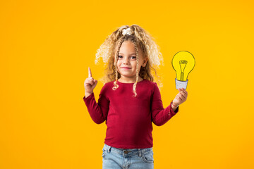 Idea Illumination. Child girl Genius with Paper Bulb.