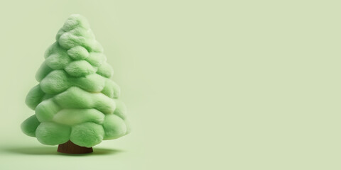 Tree-shaped stuffed toy on green background banner with copy space.