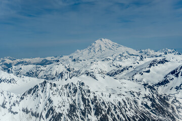 liamna Volcano, or Mount Iliamna glacier covered stratovolcano in Aleutian Range of southwest Alaska. Chigmit Mountain subrange in Lake Clark National Park and Preserve.