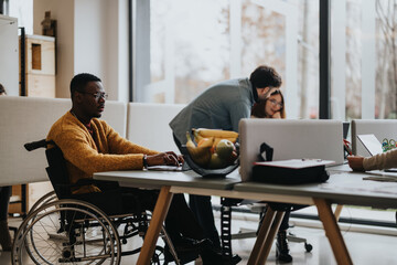 Inclusive modern workplace environment with multiethnic staff and interactions.