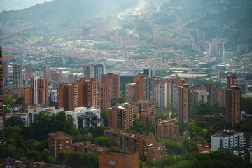el poblado medellin colombia filled with nature and buildings residential and commercial