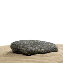 Pebble podium on sand with white background