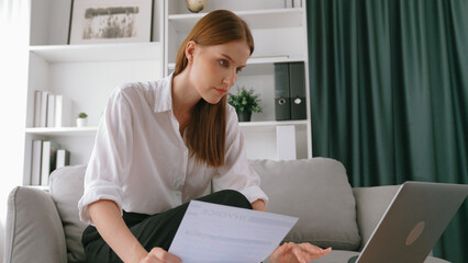 Stressed young woman has financial problems with credit card debt to pay prim from bad personal...