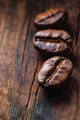 Three Coffee Beans on a Wooden Table