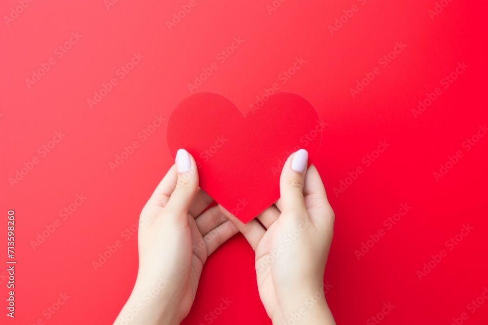 Poster heart in hands. background with selective focus and copy space