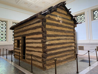 Hodgenville, Kentucky: Abraham Lincoln Birthplace National Historical Park. Symbolic log cabin in memorial building. 