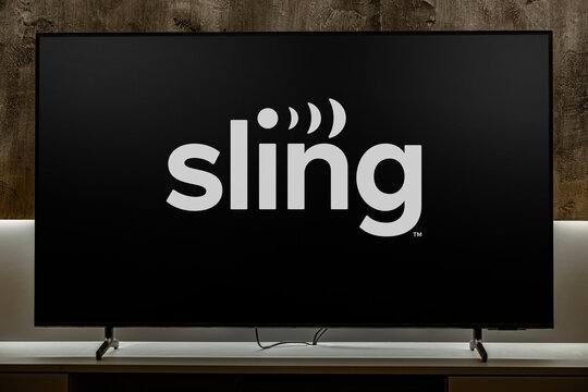 Flat-screen TV set displaying logo of Sling TV
