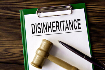 DISINHERITANCE - word on a white sheet with a judge's gavel
